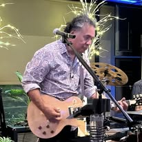 Randy playing guitar